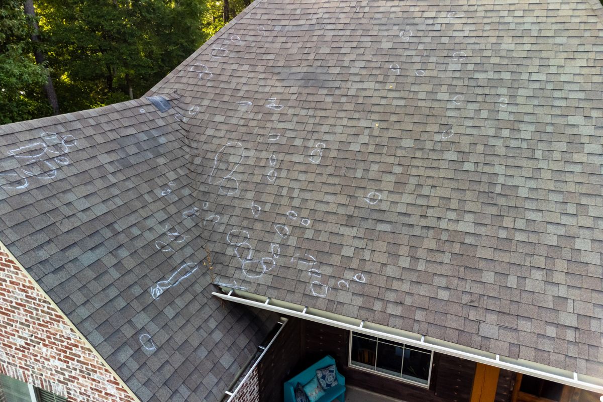 A close-up view of a roof painted white, showcasing its smooth and even surface under natural lighting. 